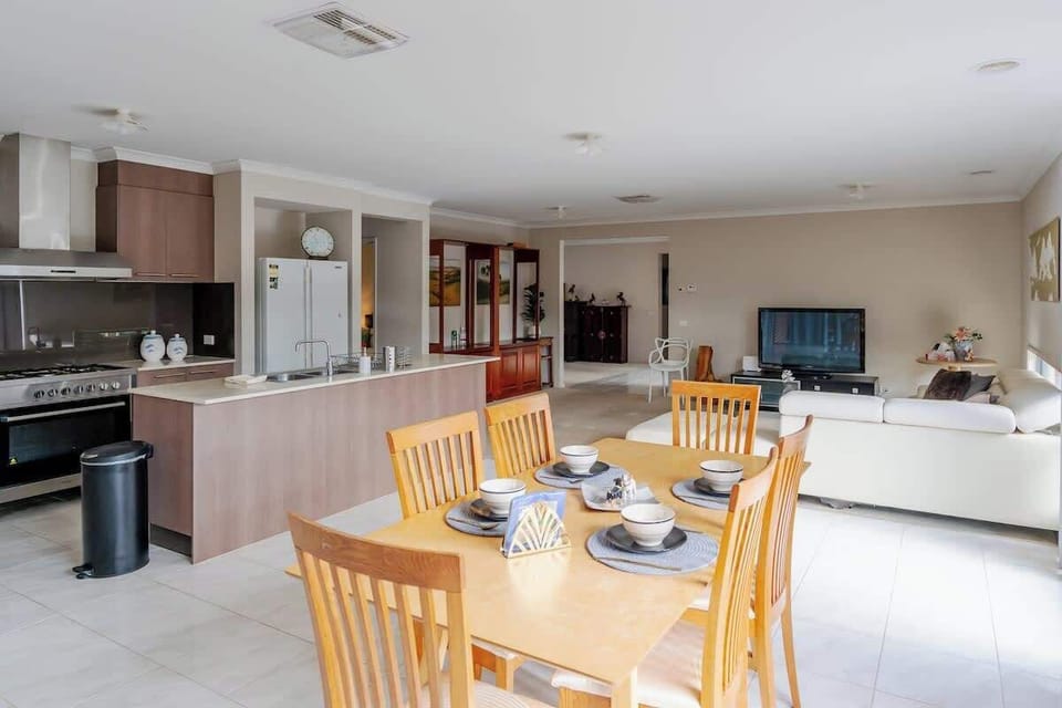 Spacious dining area next to the modern kitchen