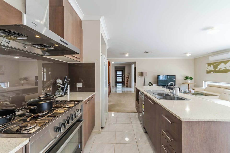 Spacious master bedroom with in-room smart TV