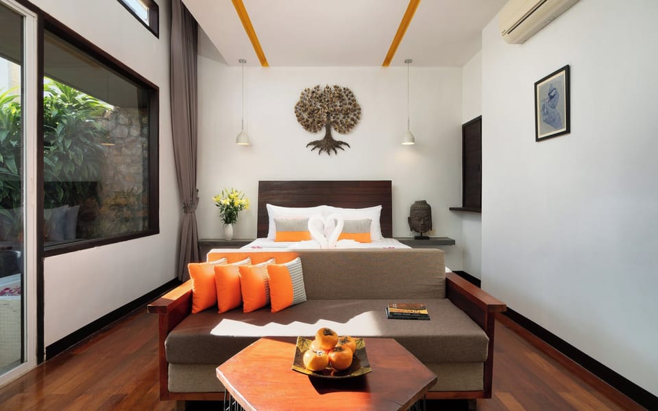 Suite with Bathtub and Terrace | Minibar, in-room safe, individually decorated, individually furnished