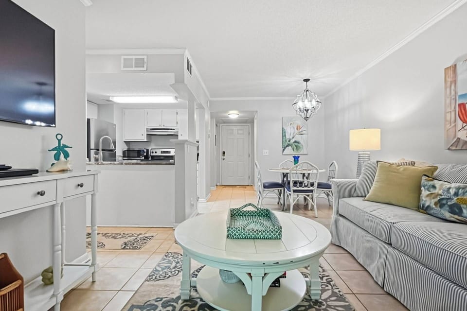 Cook, dine, and enjoy your favorite shows in the open concept living area.