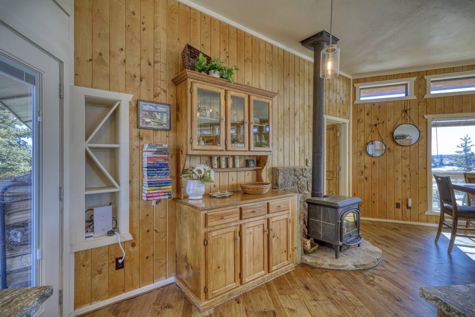 The lovely wood stove makes this modern mountain retreat feel even more charming. This layout is a guest favorite for family gatherings - Sleeps 9.