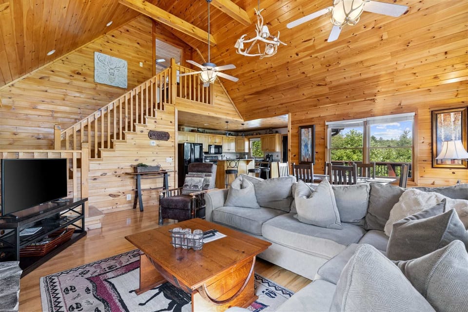 Experience seamless living with our open floor plan, where the living room flows effortlessly into the kitchen and dining area