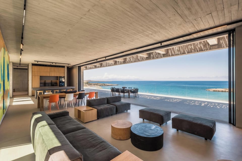 Open plan living and kitchen area, accompanied by breathtaking sea views