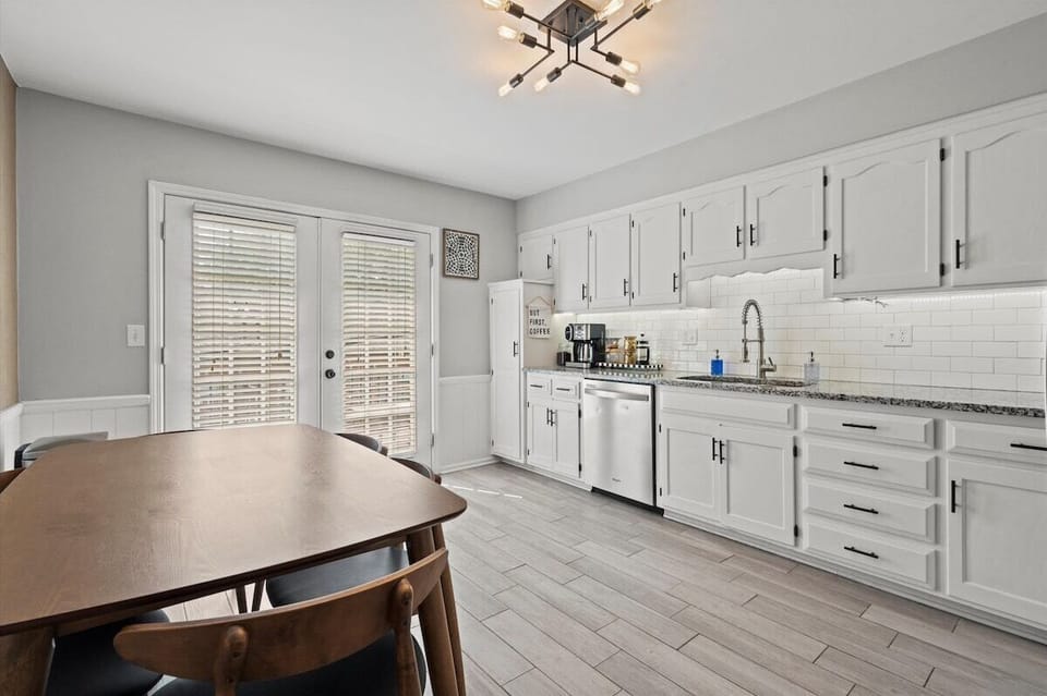 Open kitchen and dining area designed for shared meals and easy entertaining.