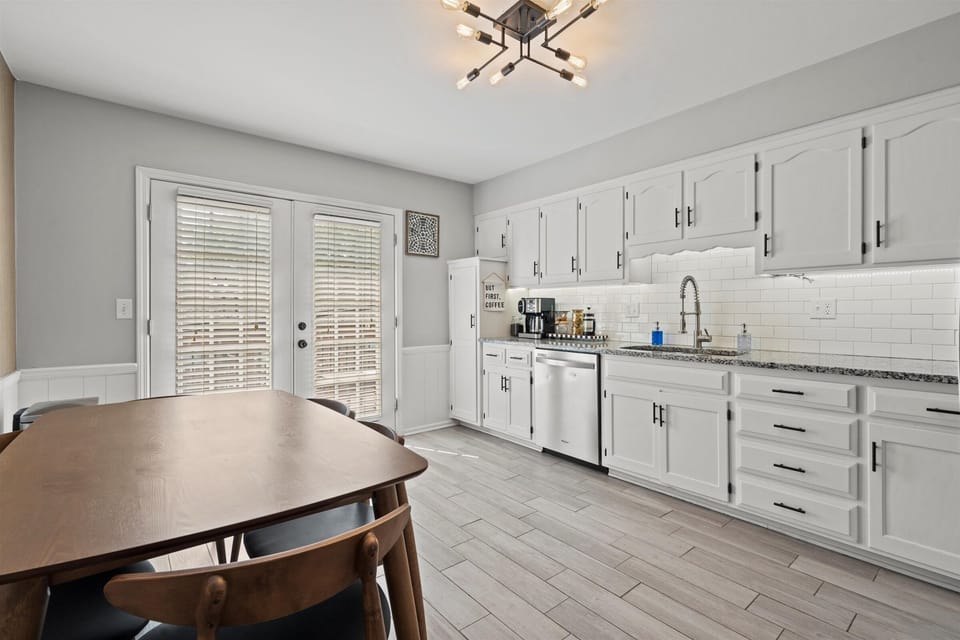 Open kitchen and dining area designed for shared meals and easy entertaining.