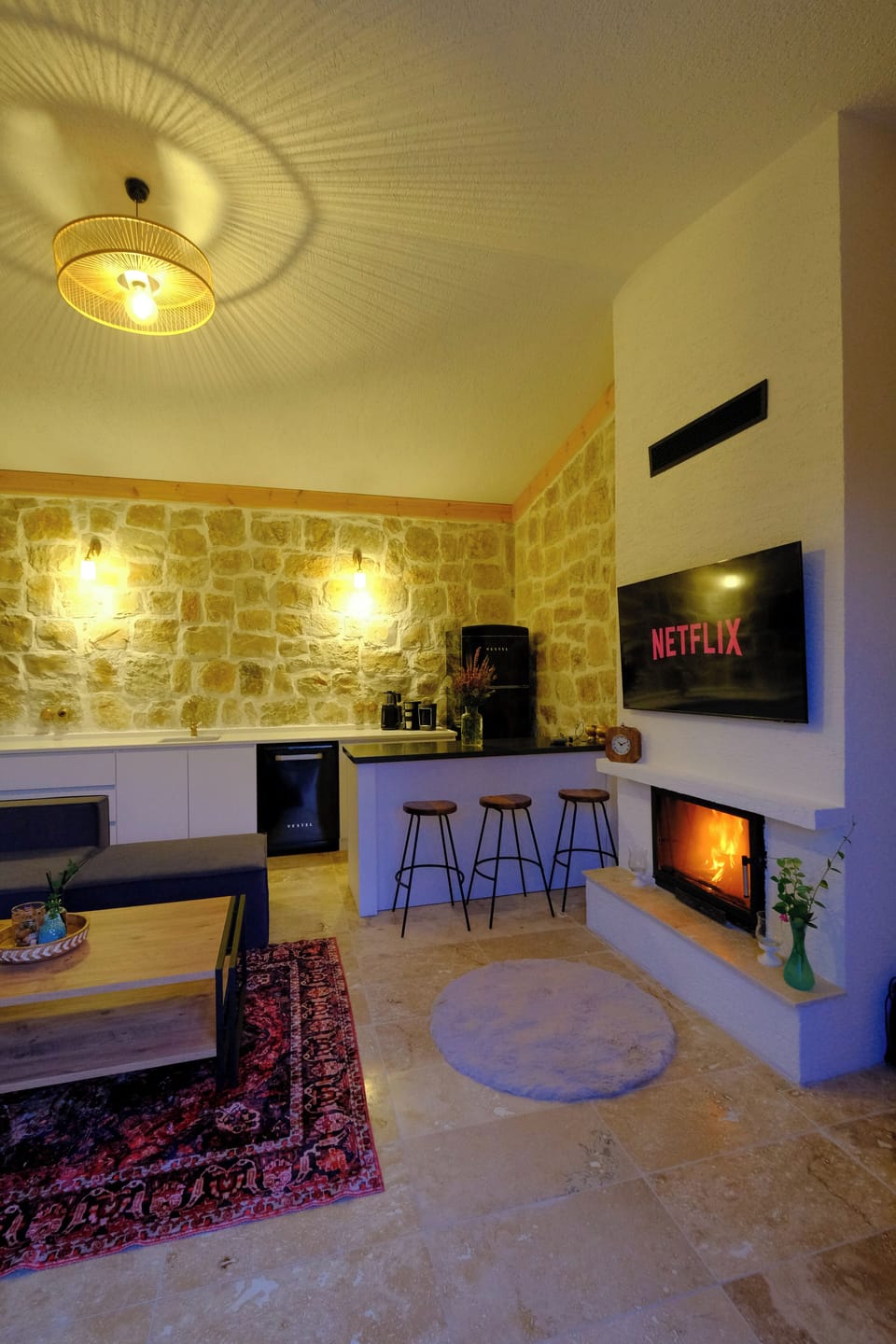 Deluxe Quadruple Room, Garden View | Living area | TV