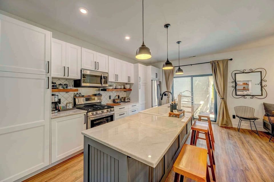 A modern kitchen with ample counter space and natural light.