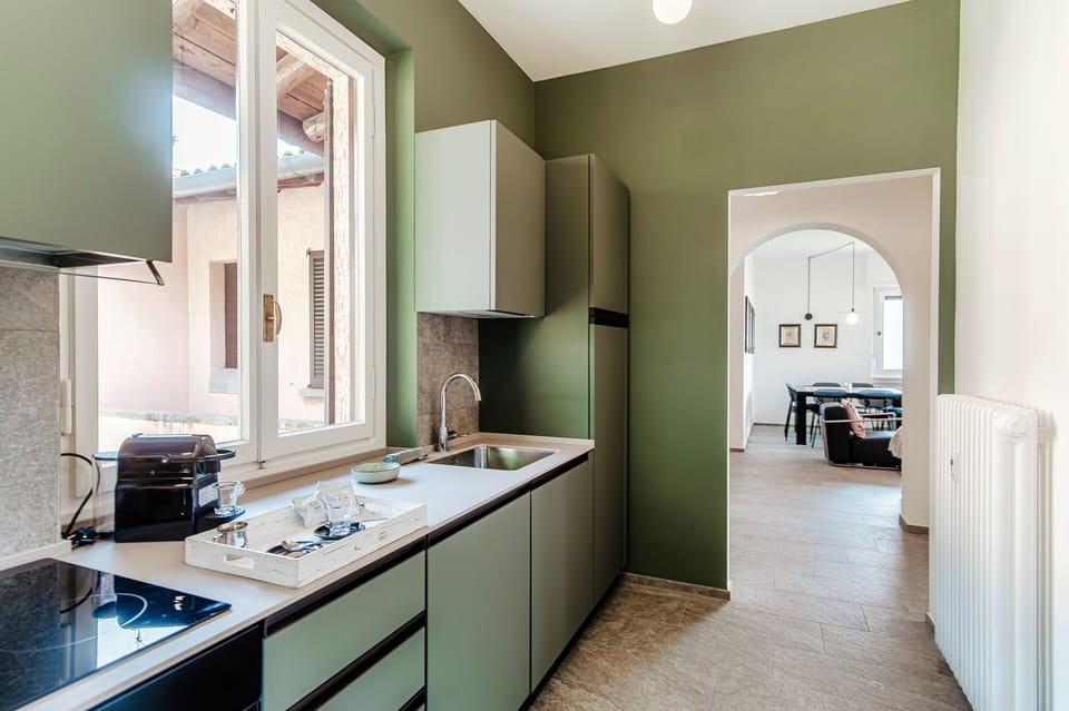 Apartment, Lake View | Private kitchen | Full-size fridge, oven, stovetop, dishwasher