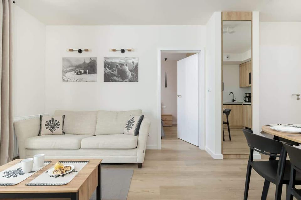 Enjoy your favorite shows on the flat-screen television in the elegant living area.