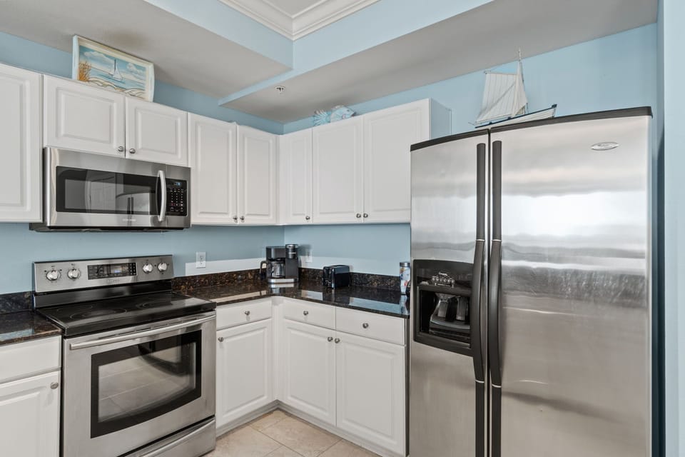 The kitchen is complete with your modern appliances including a Keurig.