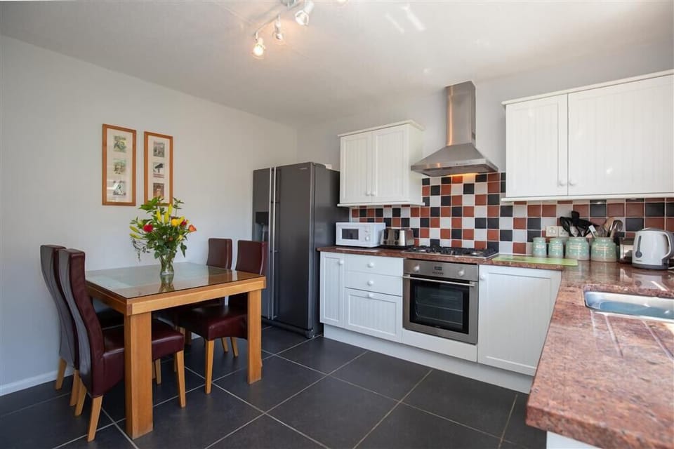 Fridge, dishwasher, cookware/dishes/utensils