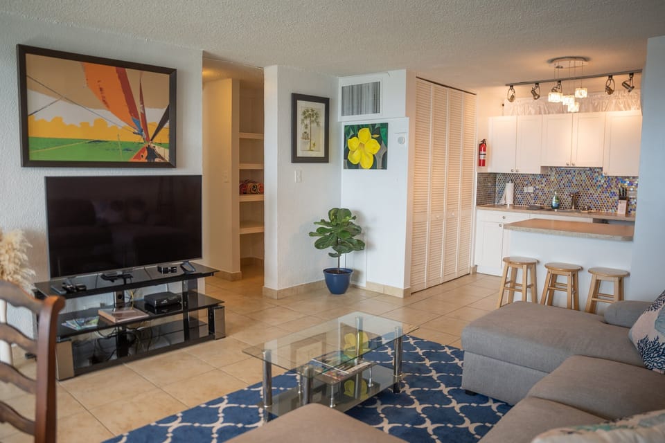 Living room offers cable TV, and all of the smart TV applications, so you can watch anything you desire. 