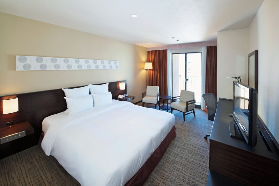 Premium bedding, down comforters, in-room safe, desk