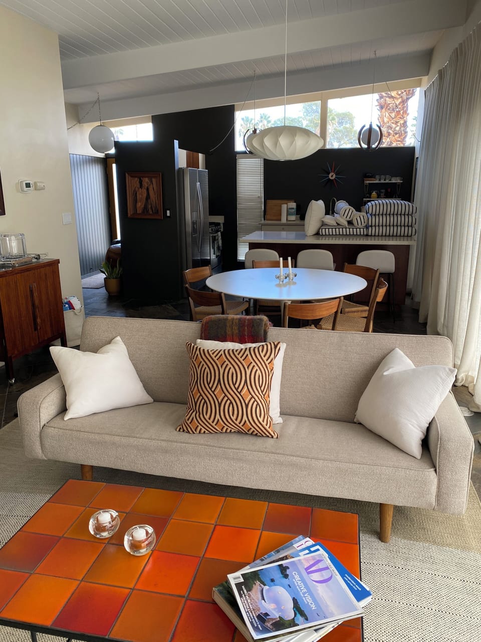 The Hans Wagner sofa is paired with a custom Heath tile coffee table.