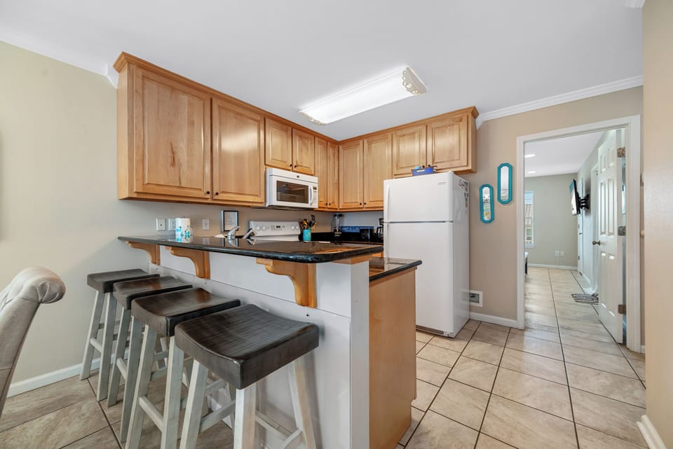 Breakfast bar and kitchen