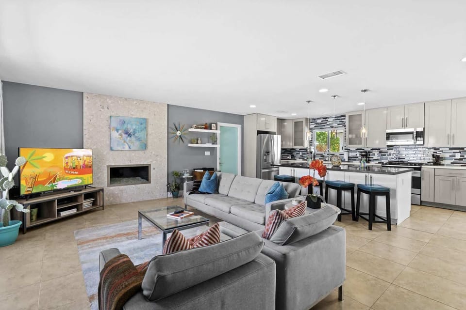 Living room opens to kitchen