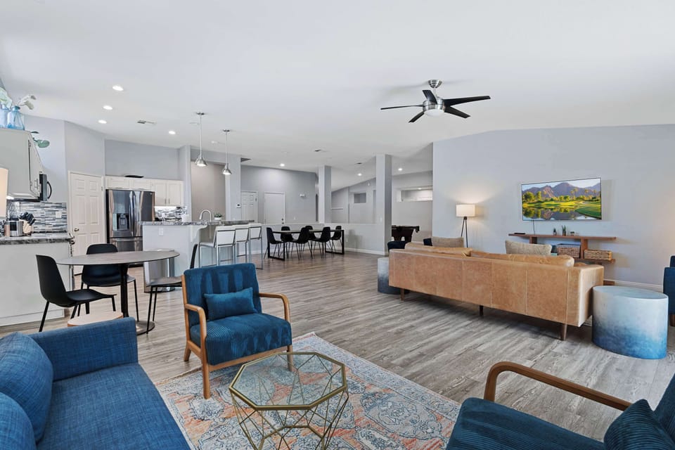 Cozy and spacious living area with TV