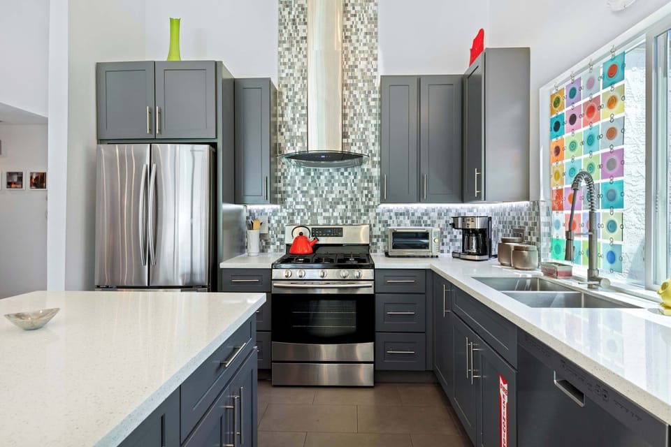 The spacious kitchen is well-equipped for your visit & offers all the comforts of home