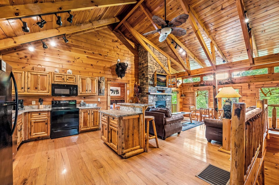 Step into your luxury cabin surrounded by beautiful wood work & custom design!