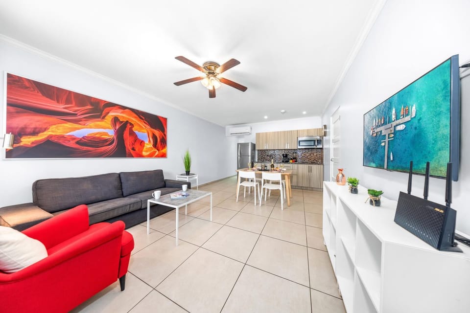 Elevate your everyday in our bright, spacious living room. Its perfect blend of style and comfort creates the ideal setting for relaxation and entertaining. Discover the heart of your new home.
