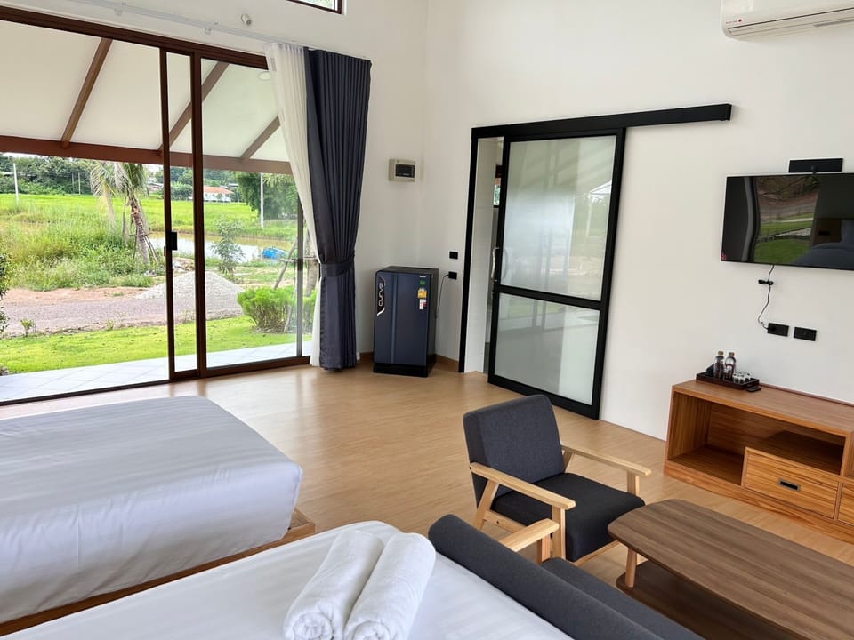 Deluxe Villa, Garden View | Living area