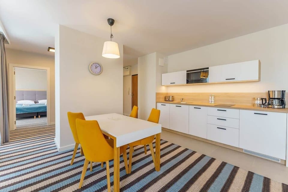 The fully equipped kitchenette includes everything you need for a home-cooked meal.