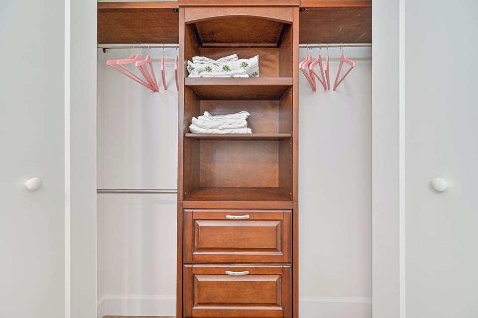 Vanderbilt Bonita - An oversized custom walk-in closet in the primary suite
