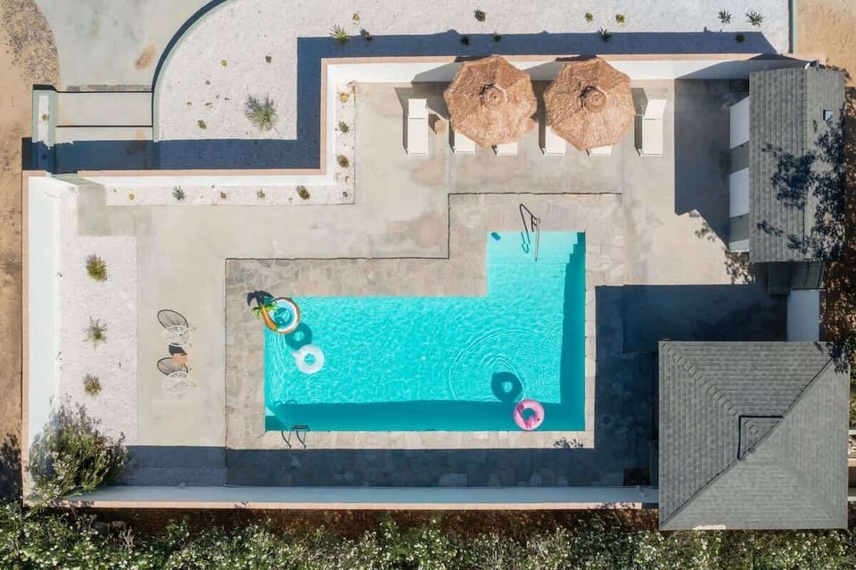 Ariel view of the home's gigantic pool to be enjoyed year round.