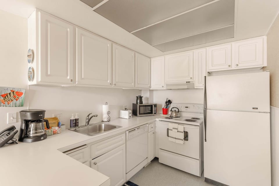 Fuel your adventures in this functional kitchen! Essential appliances make meal prep easy and convenient during your stay.