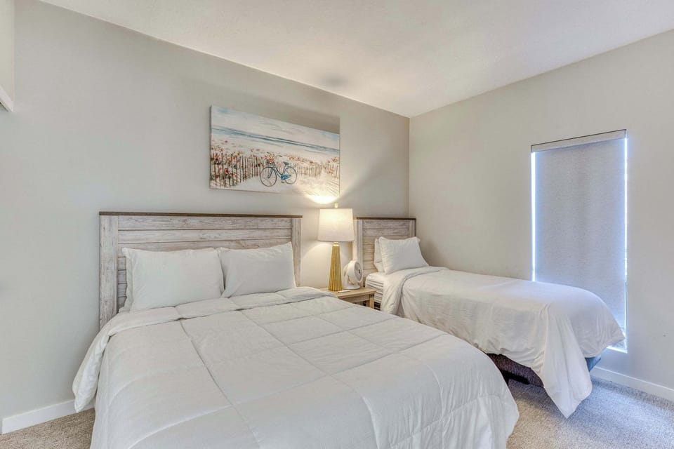 Cozy twin retreat! Enjoy a comfortable stay in this bright and welcoming bedroom.