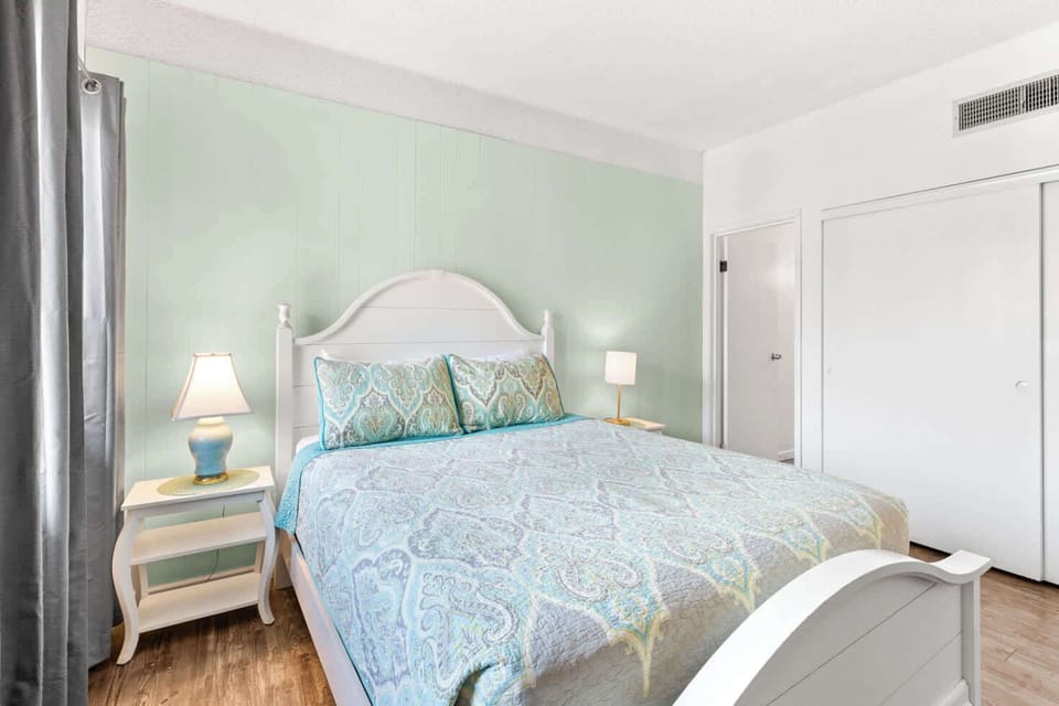 Settle into this charming bedroom for a restful night. Enjoy the cozy ambiance and wake up ready for a new day!