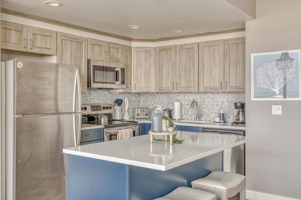 Functional kitchen providing essential appliances creating a clean and practical cooking space