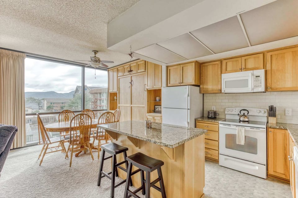 Whip up a feast with a view! Our spacious kitchen and dining area are perfect for memorable meals.