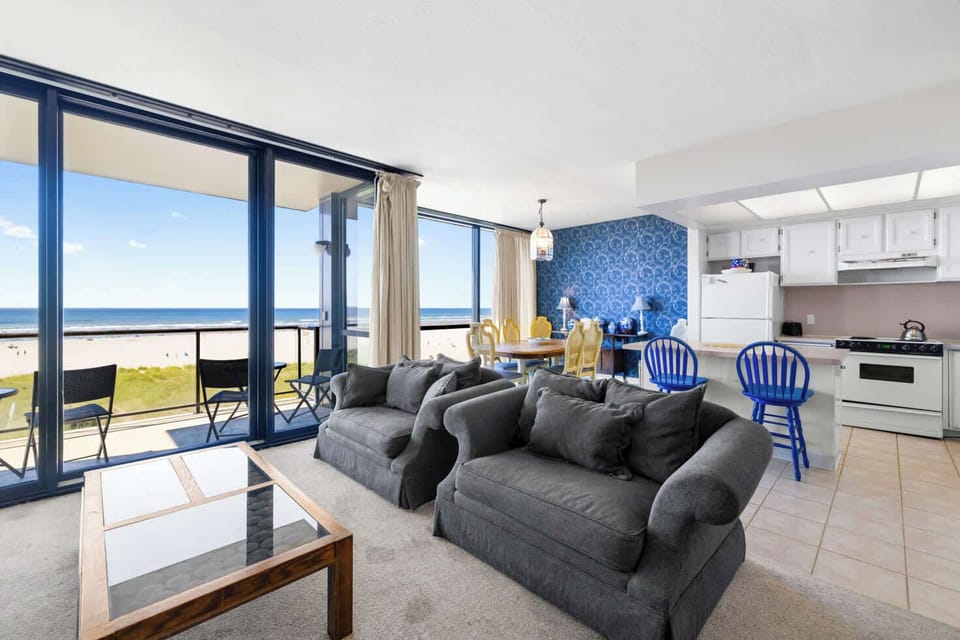 Your dream beach vacation starts here! Seamless living with stunning ocean views from kitchen to living room.