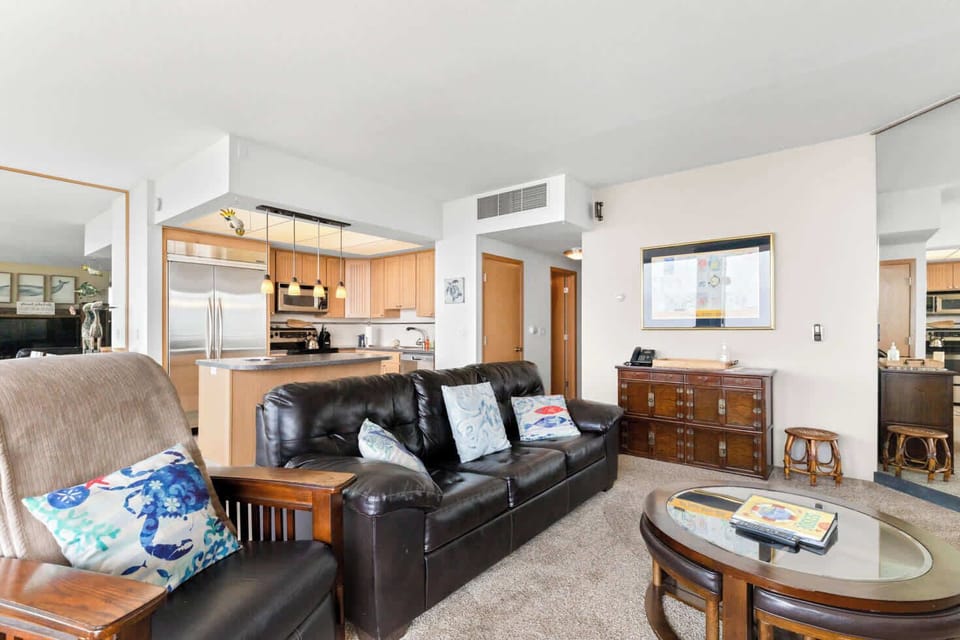 Enjoy seamless flow between the comfortable living area and modern, fully equipped kitchen.