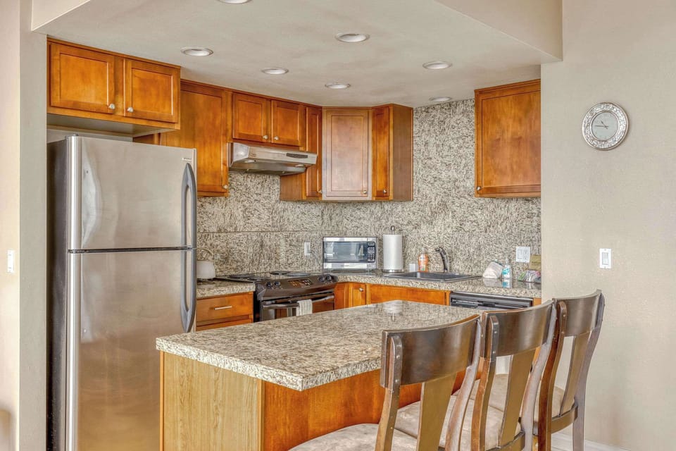 Functional kitchen providing essential appliances creating a clean and practical cooking space