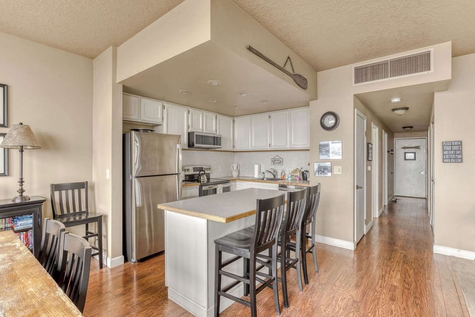 Functional kitchen providing essential appliances creating a clean and practical cooking space.