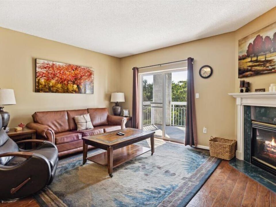 Spacious Living Room with Gas Fireplace, Sleeper Sofa and SMART TV with Cable & WIFI throughout vacation rental