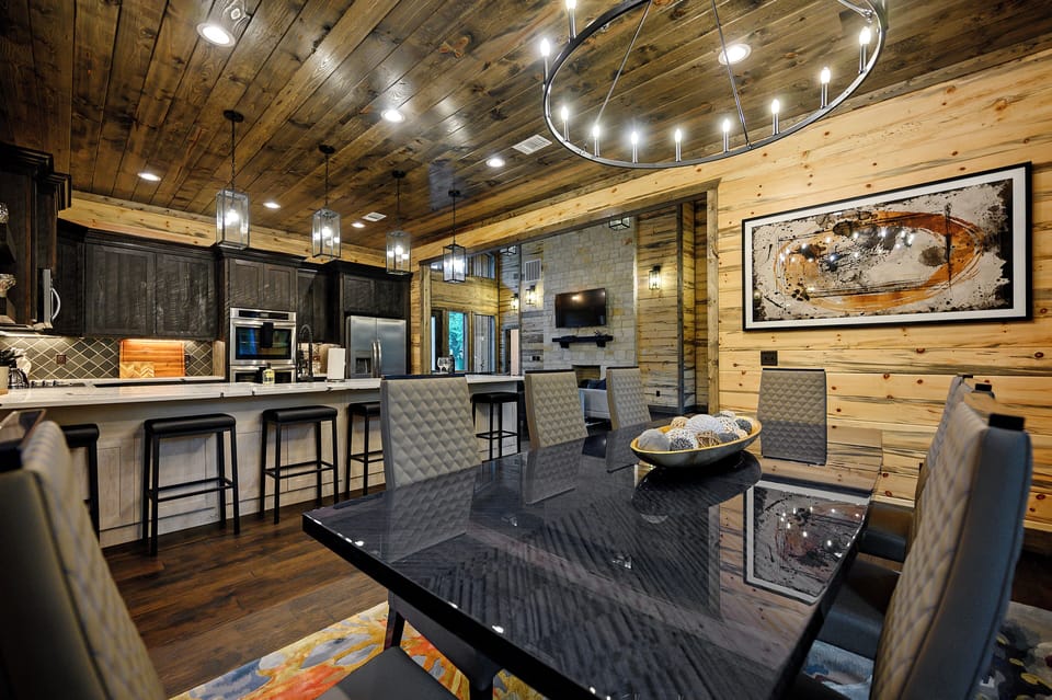 Open concept living, kitchen and dining spaces.