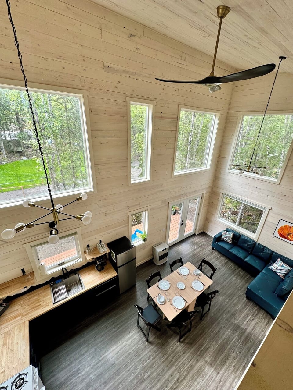 Gather comfortably in this large cabin with a full kitchen, spacious living room, and dining table for six.