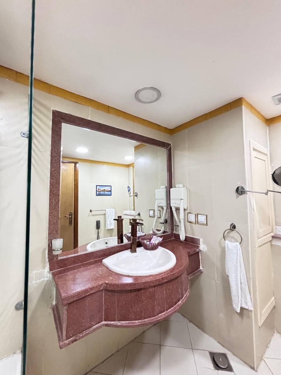Hair dryer, slippers, towels, soap