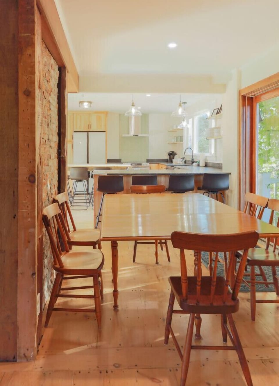 Comfortable dining area with seating for 8 off the kitchen