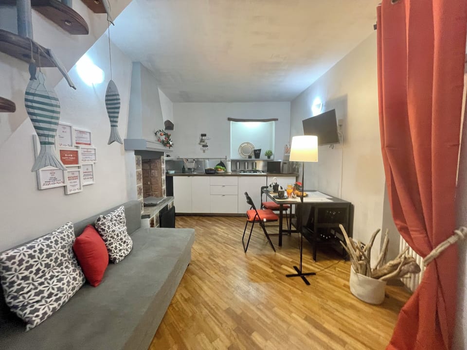 Apartment, Non Smoking | Living area | Flat-screen TV