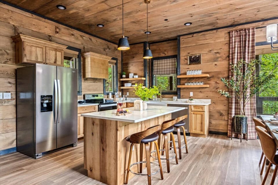 The kitchen includes all new stainless steel appliances and is the perfect layout for the aspiring chefs in your group.