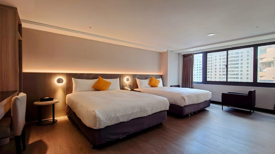 Classic Quadruple Room, City View | Desk, laptop workspace, blackout drapes, soundproofing