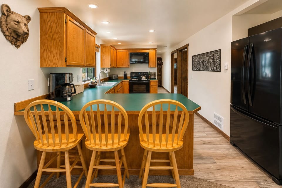 Eat up bar in the kitchen space with stools