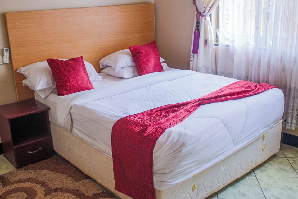 Desk, laptop workspace, free WiFi, bed sheets