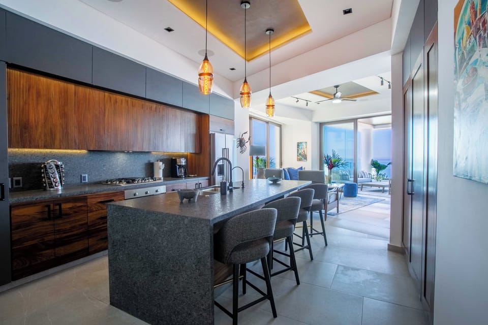 The gourmet kitchen is fully equipped with all the essentials for your culinary needs
