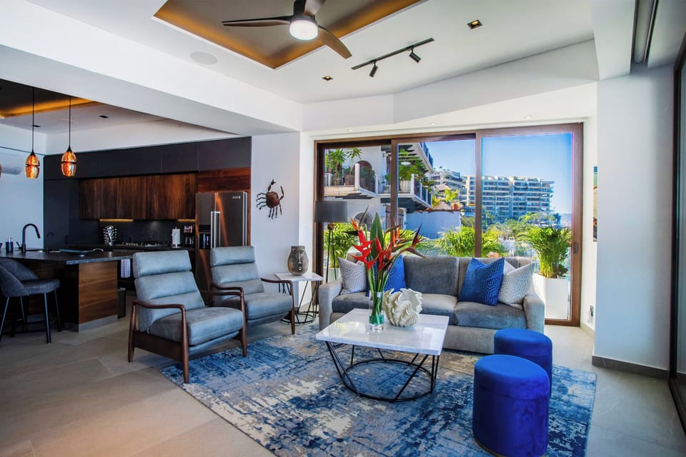 Indulge in the breathtaking panorama of the ocean right from the cozy  confines of your living room