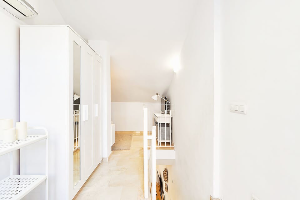 Family Duplex | 2 bedrooms, down comforters, individually decorated
